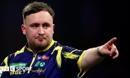 Luke Littler celebrates