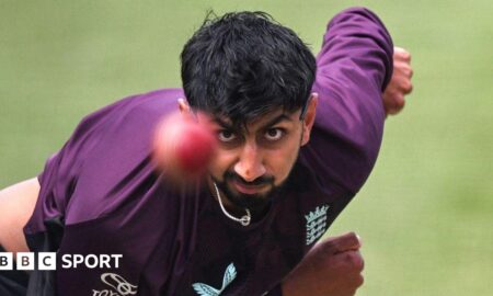 Shoaib Bashir bowling for England during training at the MCG