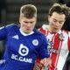 Jordan James of Leicester City (left) in action with Caspar Jander (right) of Southampton