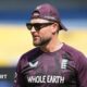 Brendon McCullum looks on during training
