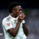 Vinicius Jr kisses the badge on his Real Madrid shirt