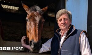 Trainer Jeremy Scott with defending Champion Hurdler Golden Ace