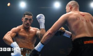Jai Opetaia (left) in action during his fight against Huseyin Cinkara in December
