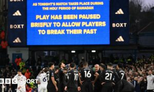 The big screen at Elland Road displays a message explaining that the game against Manchester City will be stopped to allow players to break their fast to take on water and energy as they observe Ramadan