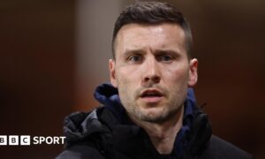 Mat Sadler on the touchline