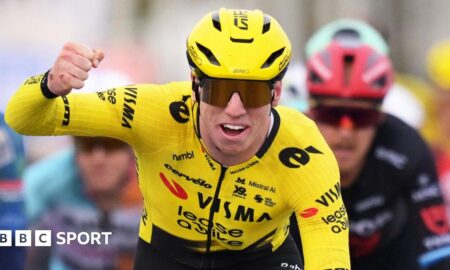 Matthew Brennan celebrates winning the Kuurne-Bruxelles-Kuurne