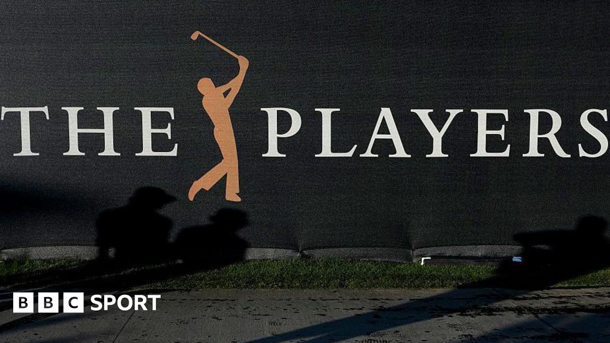 A sign at the Players Championship showing a silhouette of a person swinging a golf club between the words 'The' and 'Players'