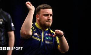 Luke Littler celebrates a 170 checkout