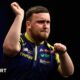 Luke Littler celebrates a 170 checkout