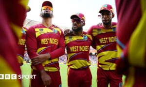 West Indies captain Shai Hope and his team-mates in a huddle before a T20 World Cup match