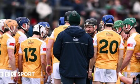 The Antrim squad huddle during a league match against Dublin in March