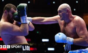 Tyson Fury landing a punch on Arslanbek Makhmudov