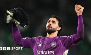 David Raya celebrates after Arsenal's 1-0 win at Sporting in the Champions League