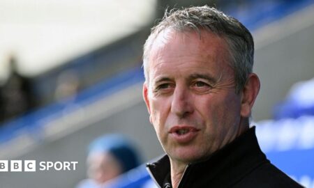 Steve McNamara looks on during a Warrington Wolves game
