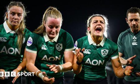 Erin King speaks to her team-mates