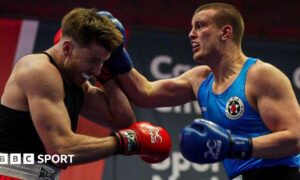 David Francis (R) lands a blow on Joshua Taylor