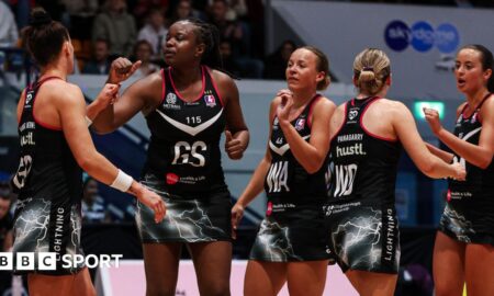 Five Loughborough Lightning players celebrate together