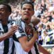 William Osula celebrates with Joe Willock after scoring for Newcastle United against Brighton at St James' Park on 2 May, 2026