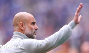 Pep Guardiola waving
