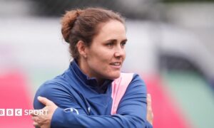 Nat Sciver-Brunt smiles during training