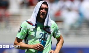Switzerland's Michel Aebischer during a hydration break at the 2026 World Cup