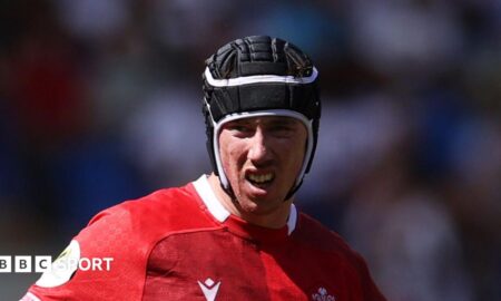Adam Beard in action for Wales