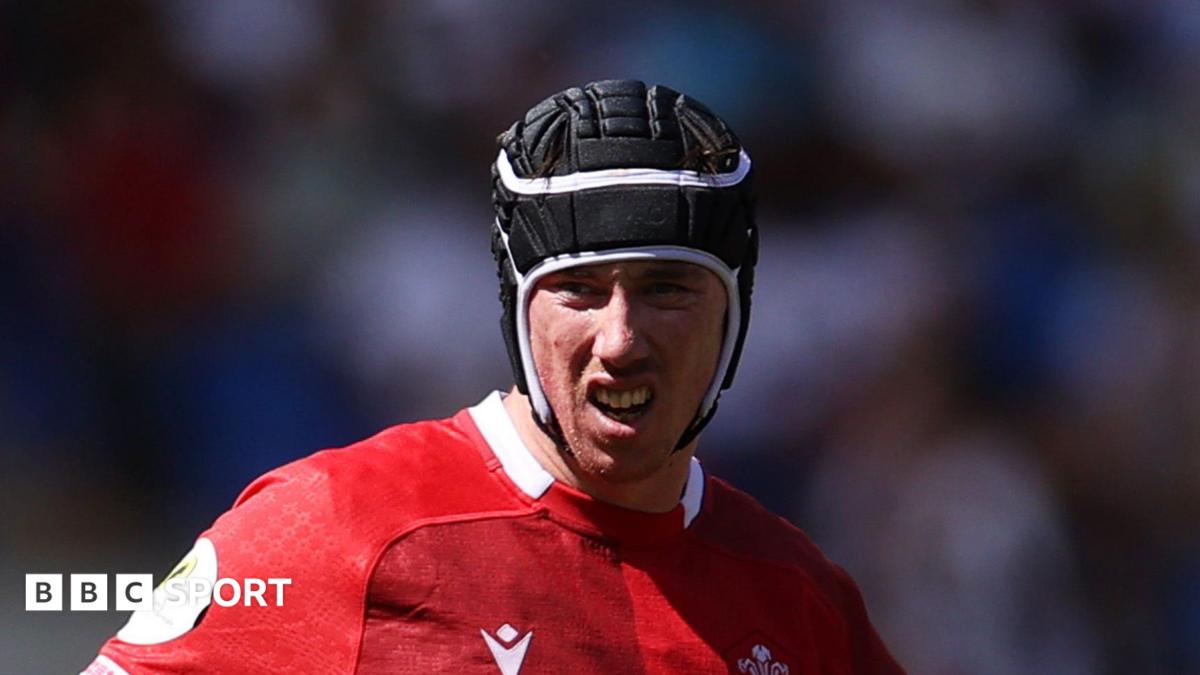Adam Beard in action for Wales