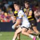 Lachie Miller looks for support to make a pass during the Super League match between York Knights and Leeds Rhinos