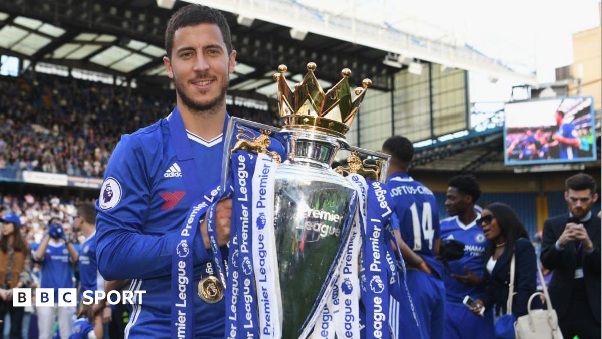 Eden Hazard of Chelsea poses with the Premier League trophy in 2017